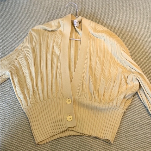 Pale yellow Aritzia low plunge cardigan
